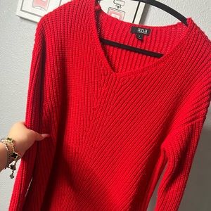 Red top sweater
